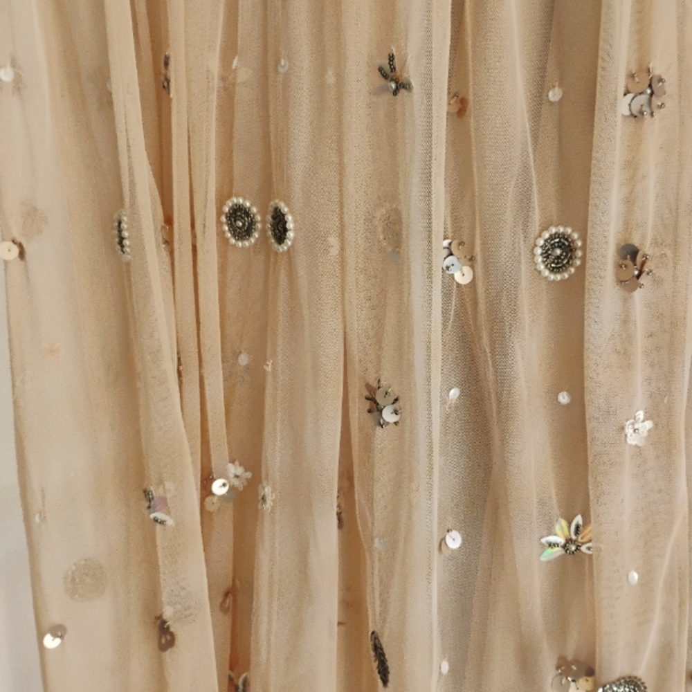 Retro '50s beaded dress with lining.